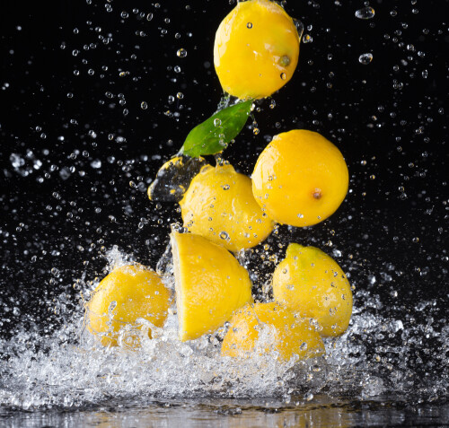 Image of Lemons Splashing on Black Background printed on Printed Glass Splashbacks